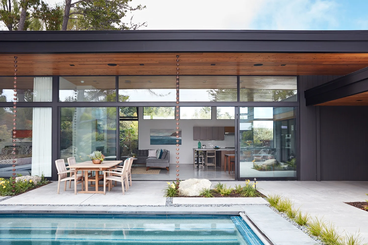 The floor is a smooth plane between the interior and exterior, which will help the couple age-in-place.