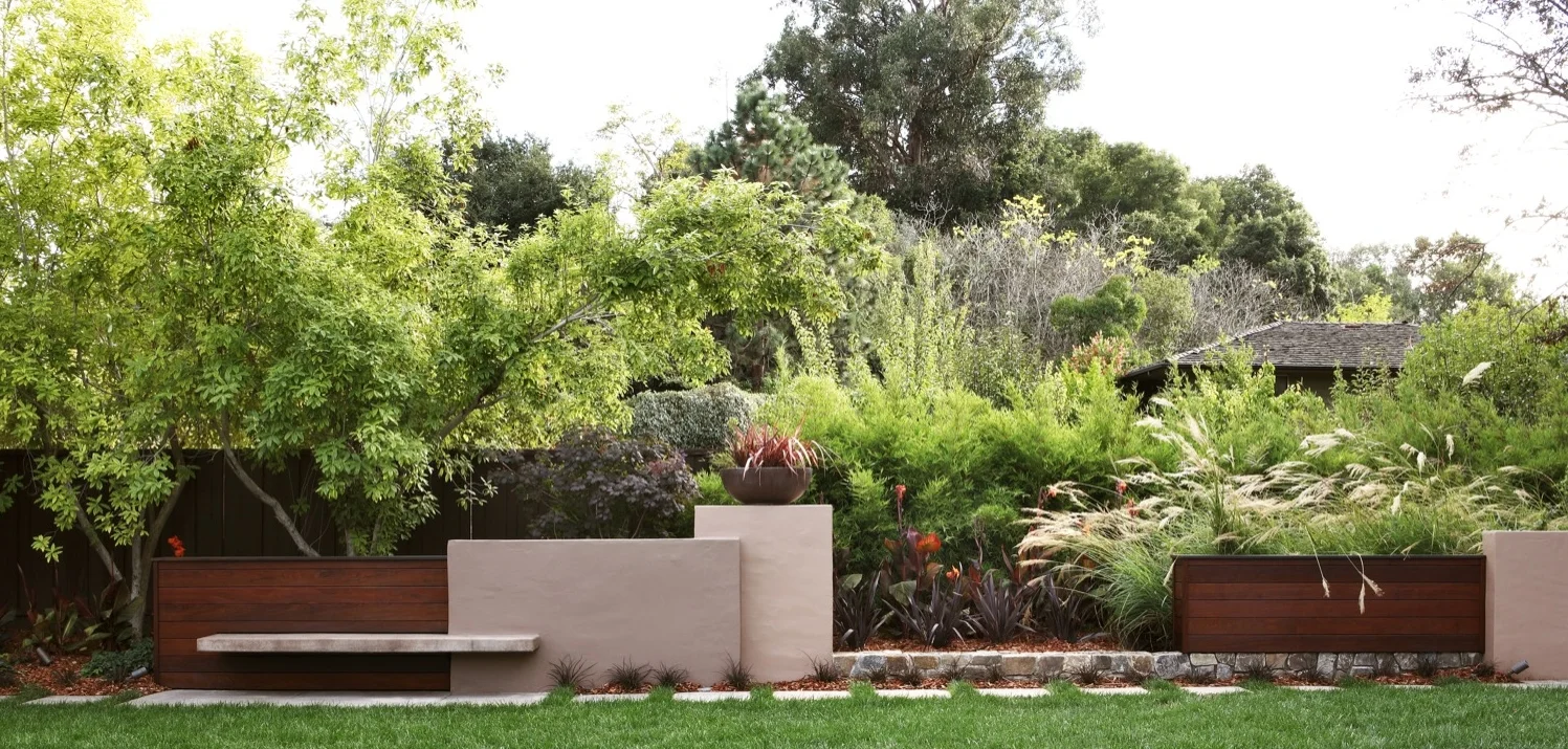 A wall with a cantilevered bench looks like a scultpure.