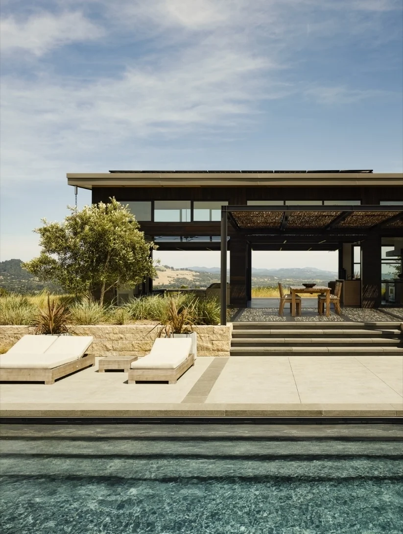 A view of the pool and outdoor dining area