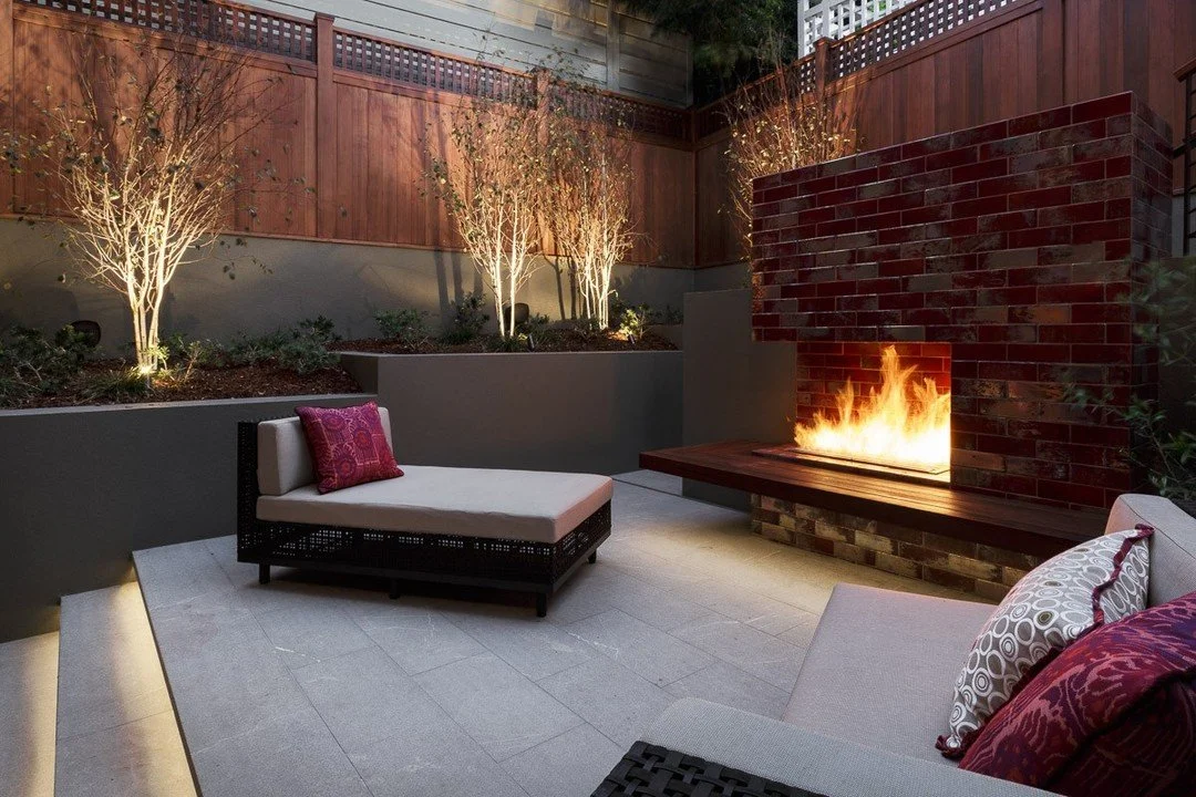 This #waybackwednesday and #arterrafridayfeature was designed to create an outdoor fireplace as a focal pint for this inwardly oriented garden space. It warms a foggy city garden with is jewel tone tiles, with or without the flames.

Architect: @wdar