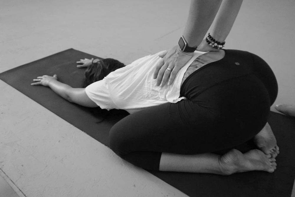 Touch + Release combined elements of yin yoga and massage is a specialized yoga class that blends yin and restorative style postures with hands-on massage and adjustments.