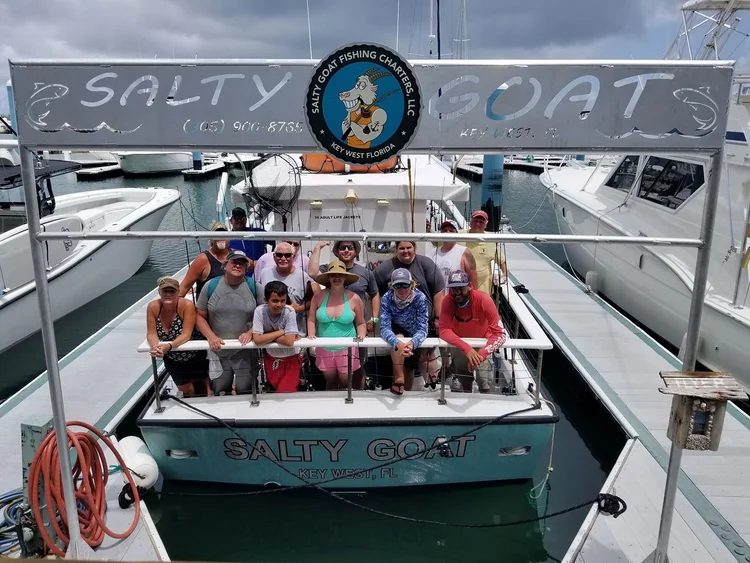 A full group on the stern of the Salty Goat