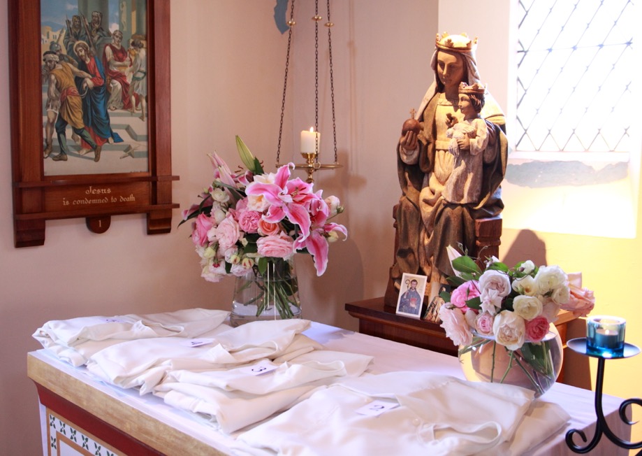 The white habits laid before Our Lady before the ceremony.