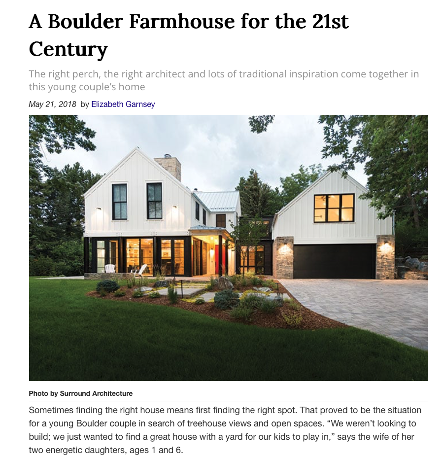 Saltwolf designed modern farmhouse style home with white exterior, black accents, large windows, and a landscaped front yard in an article in Colorado Homes Magazine.
