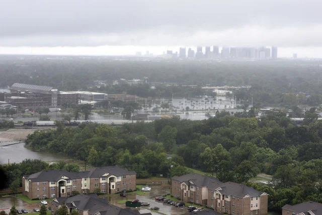 Coast Guard News - Air Station Houston A Coast Guard MH-60 Jayhawk helicopter crew from Air Station Houston conducts an overflight of a southeastern Houston neighborhood, Aug. 27, 2017. Coast Guard, Texas Air National Guard, Customs and Border Protection and other federal, state and local agencies are have been conducting urban rescues in the greater Houston area since Saturday. (U.S. Coast Guard photo by Petty Officer 3rd Class Corinne Zilnicki/Released)