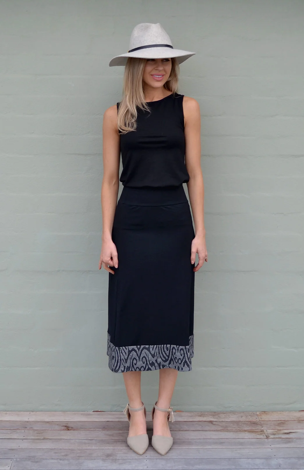 Chic and elegant with that little peek of pattern down the bottom- also available in blue 