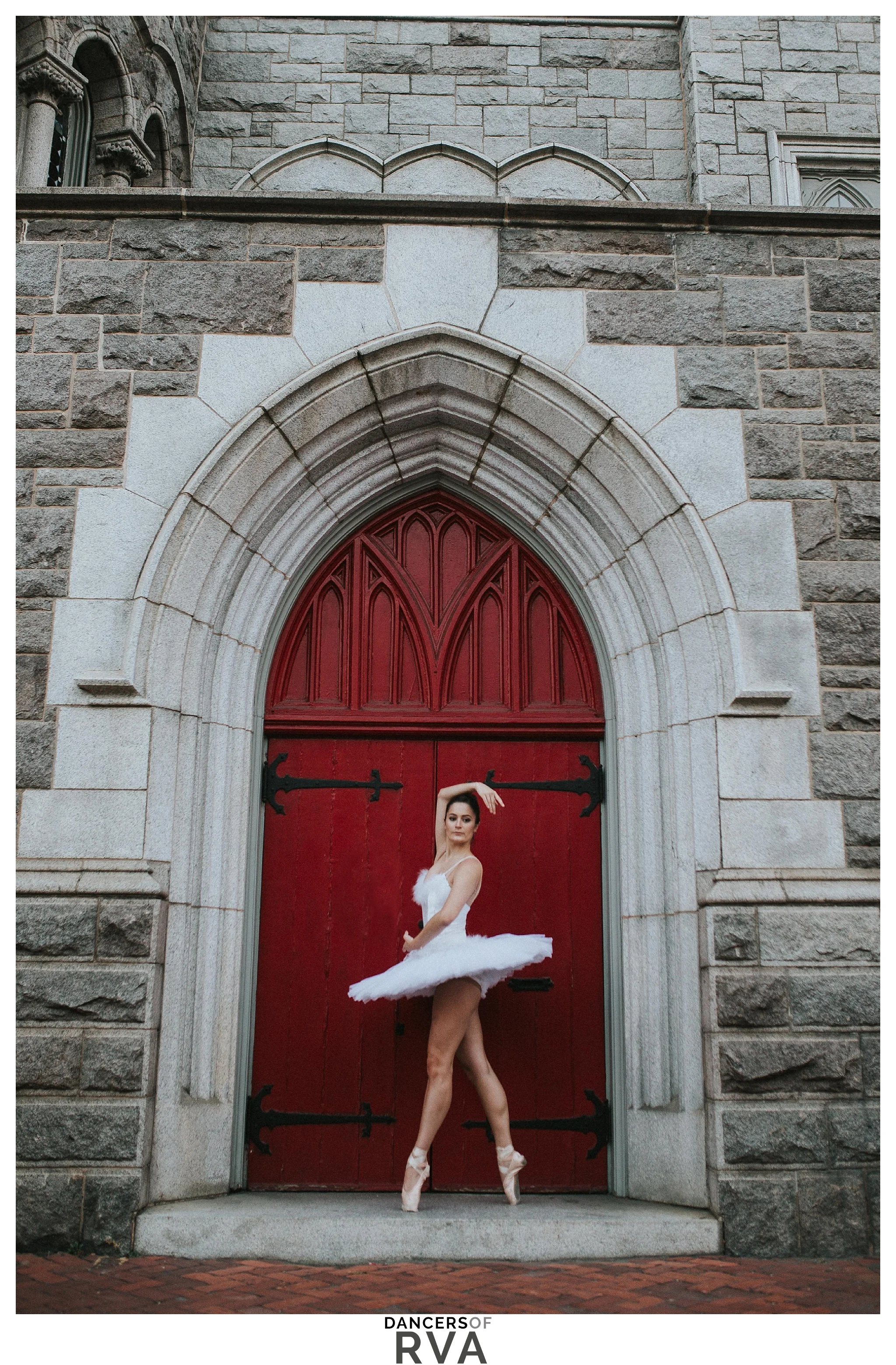 Dancers in front of red door 