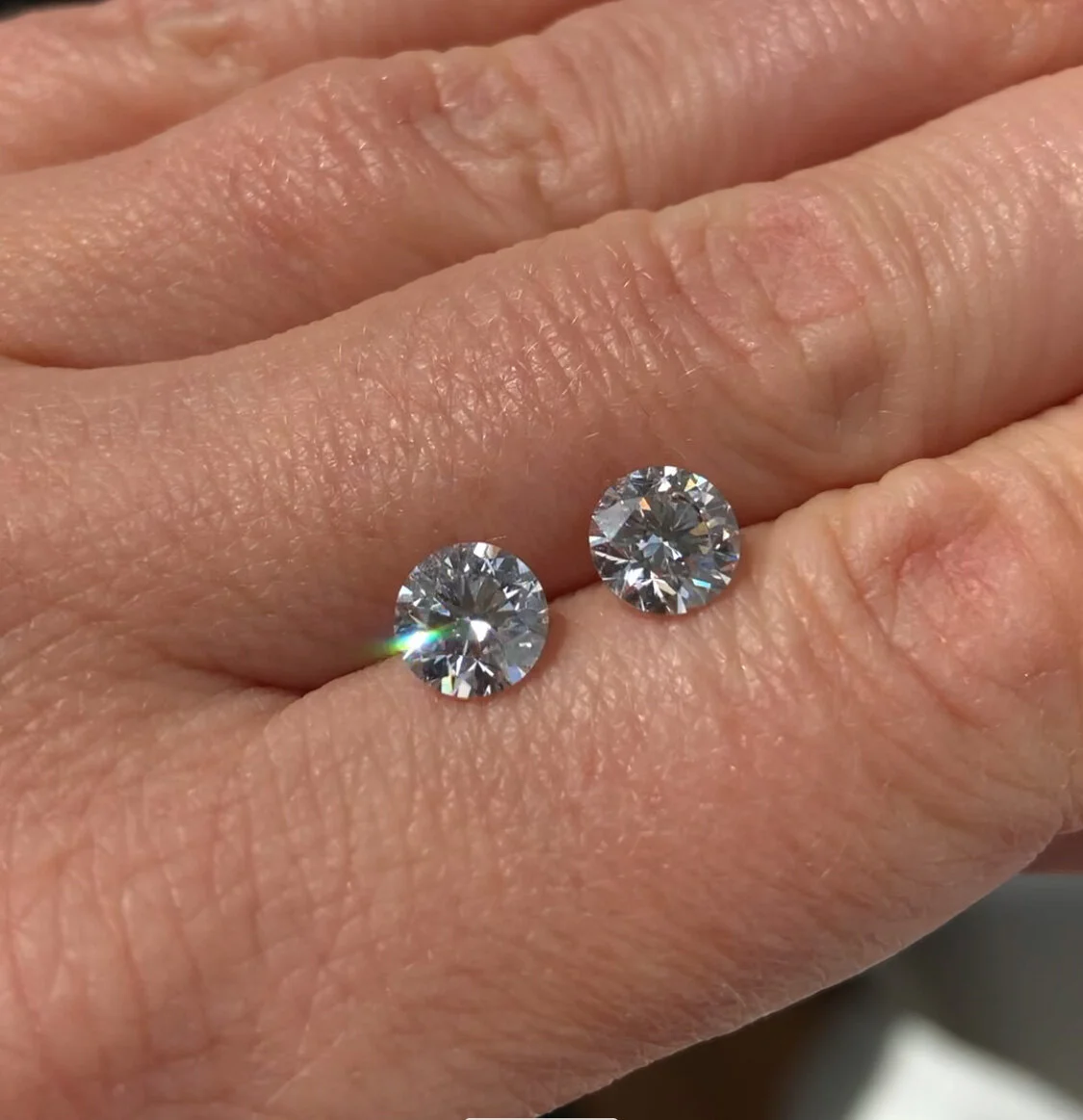 Diamond Platinum Claw Stud Earrings.