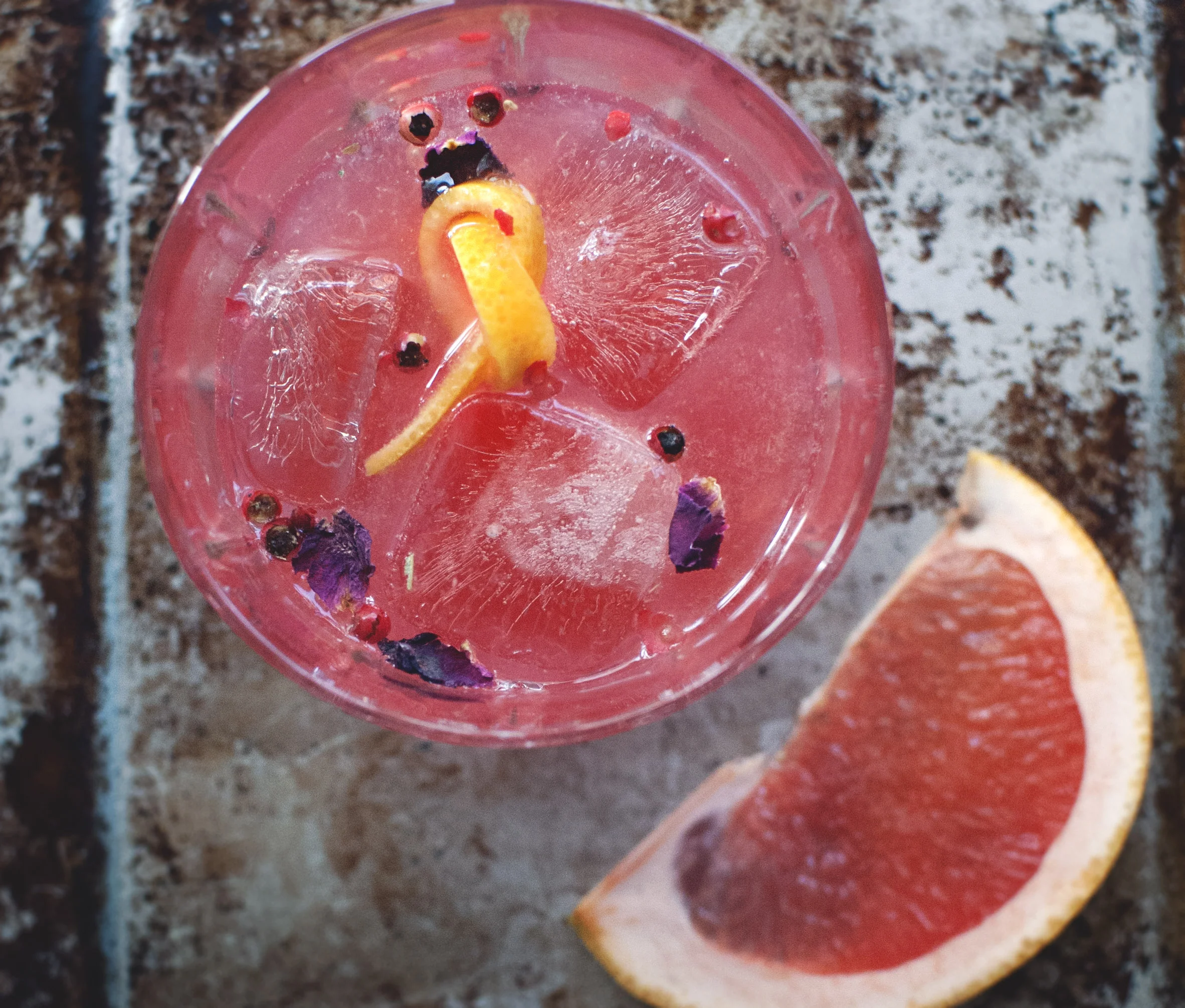 Pink grapefruit + Pink Rose Syrup = The most fantastically colored drink in all the land.