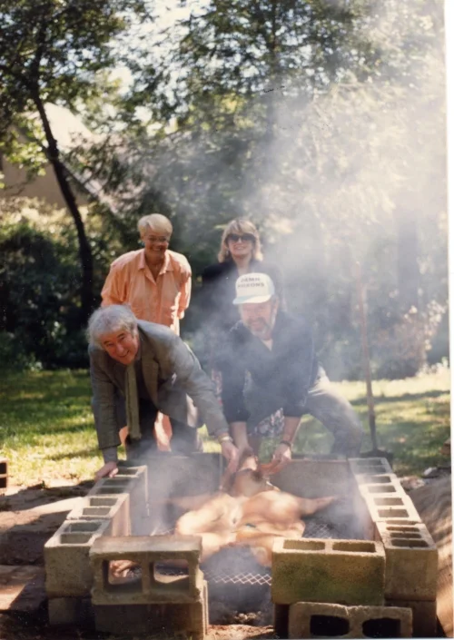 Seamus Heaney and Ronald Schuchard (front), with Keith Schuchard and Marie Heaney at the barbecue pit.
