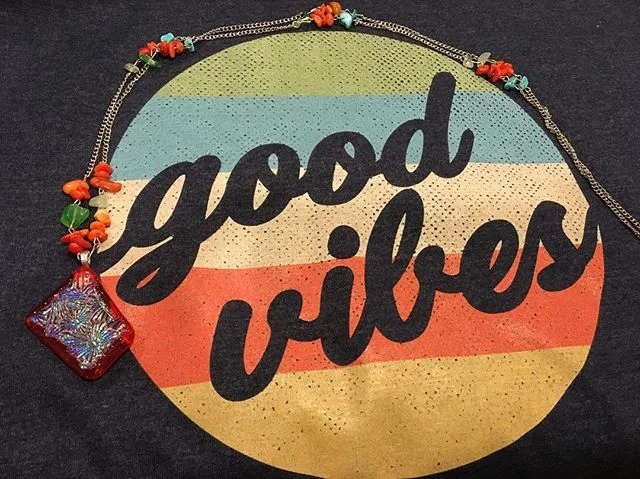 Feeling all the good vibes with this fused glass dichroic necklace from @lubianistudios  #fusedglass #fusedglassart #dichroicglassjewelry #fusedglassartist #handmadejewelry #paragonkiln #art #dichroicglass #jewelry #evenheatkilns #orange #handmade #a