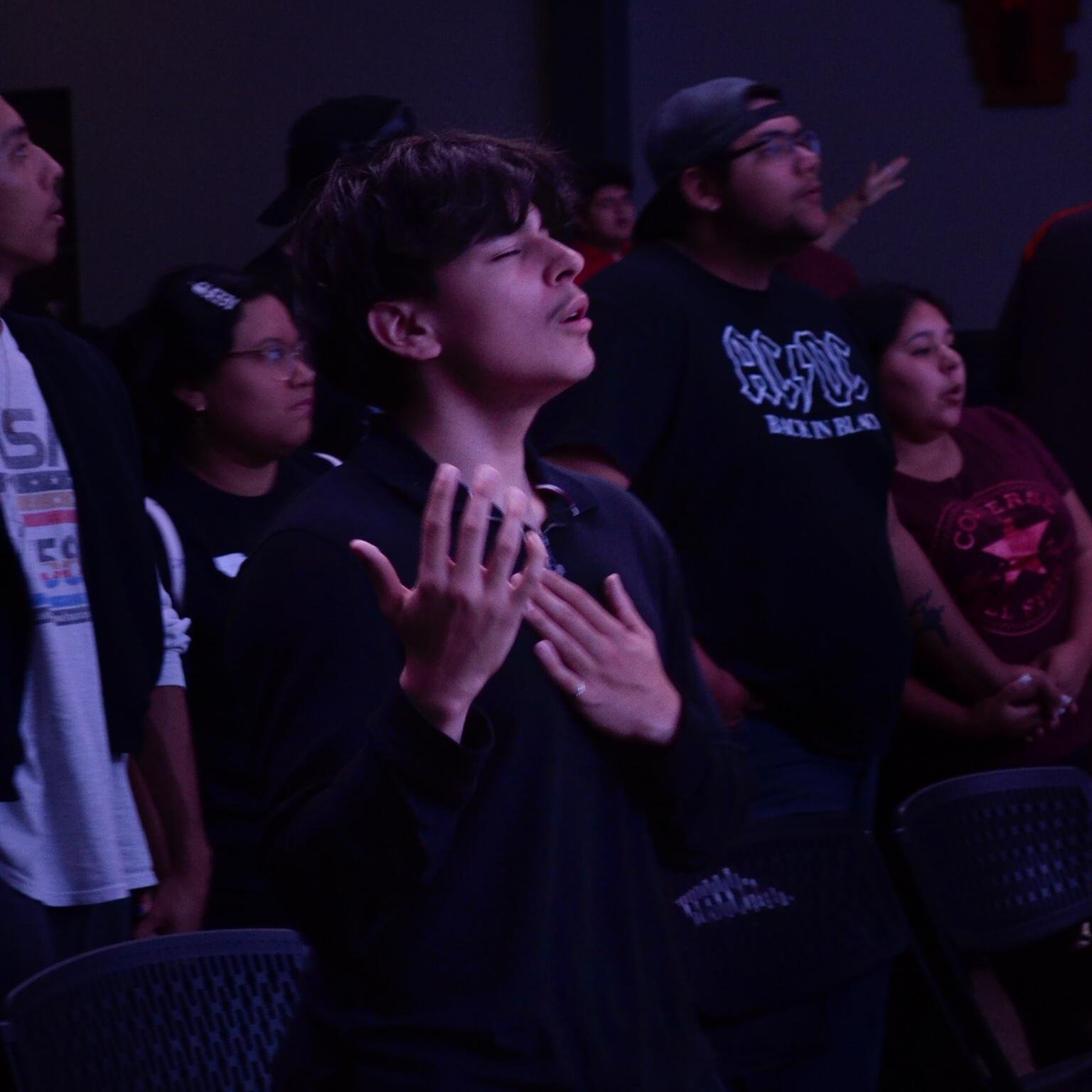 Cris worshipping.jpeg