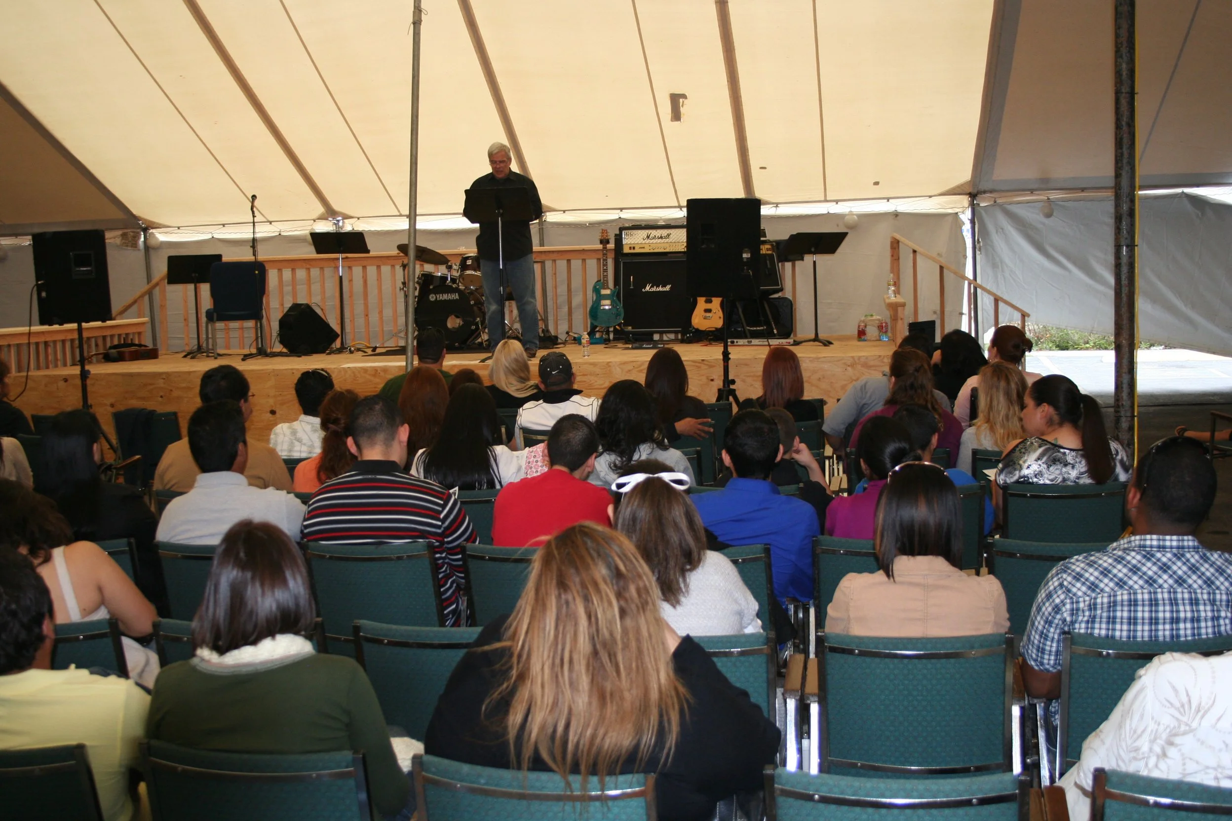 Pastor Kenny Preaching in a Tent