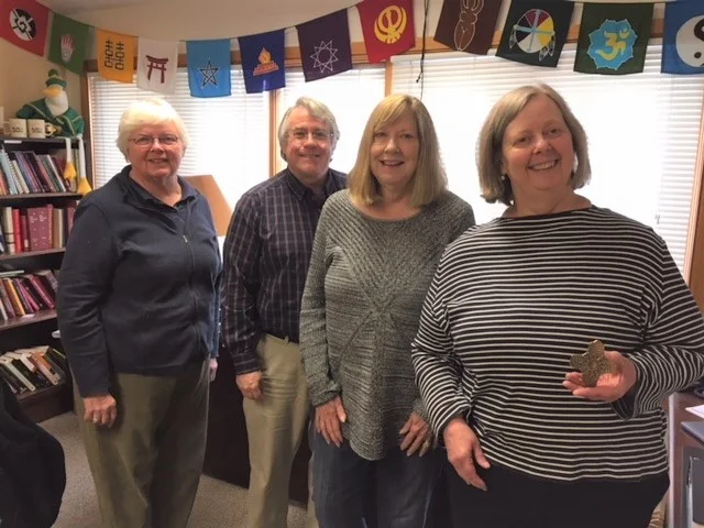 Congregational Care Ministry Core Team, Left to Right: The Rev. Sandy Boyd, affiliate clergy |Greg Bell, vestry member and Eucharistic Visitor Ministry Leader | Bev White, M.A., long-time parishioner and professional counselor | Karin Elsen, Jr. Warden and Eucharistic Visitor, holding the “Hands Together” cross