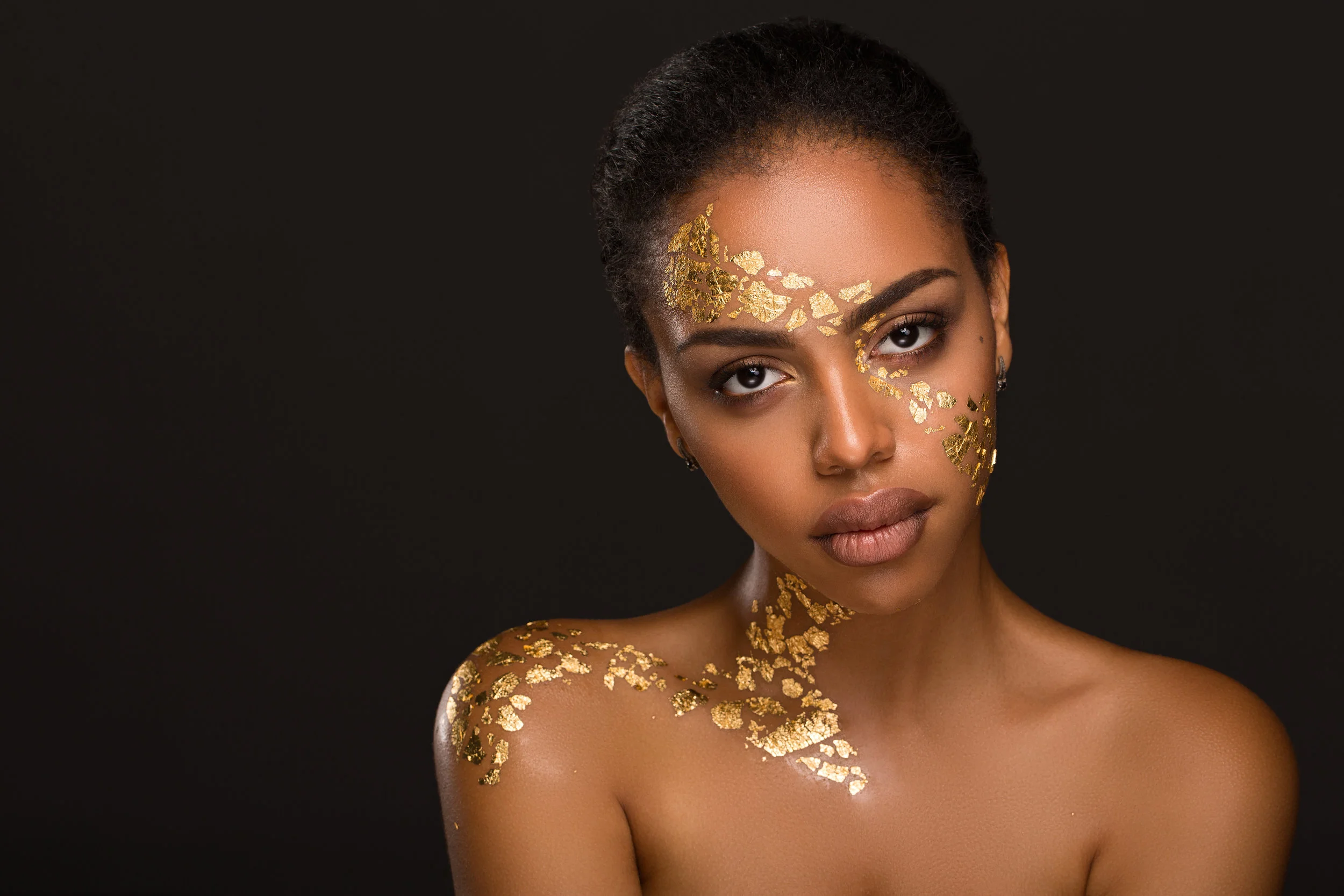 Beautiful young black woman with makeup