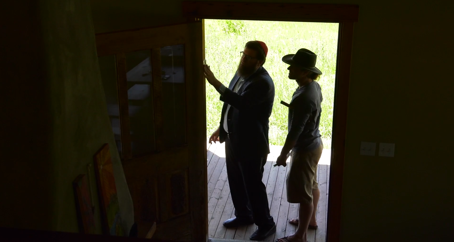 Rabbi Chaim putting up a Mezuzah, Bozeman, MT