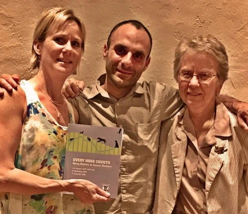 This isn't the first time I've worked closely with someone who I'd never met face-to-face. J.M. Scarlett, DVM, MPH, PhD (far right) and I only met at our celebratory dinner after the job was approved and ready to go. M. Greenberg, DVM (center) and I met only rarely in person. Most of our work was done via the internet. How convenient is that?! (I've even had clients that I've never met in person!)
