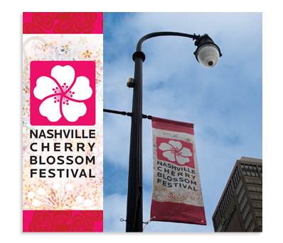 Pole banners help attendees find the Nashville Cherry Blossom Festival in all the rush of downtown activity, especially if they don't take advantage of the easy and inexpensive shuttle.