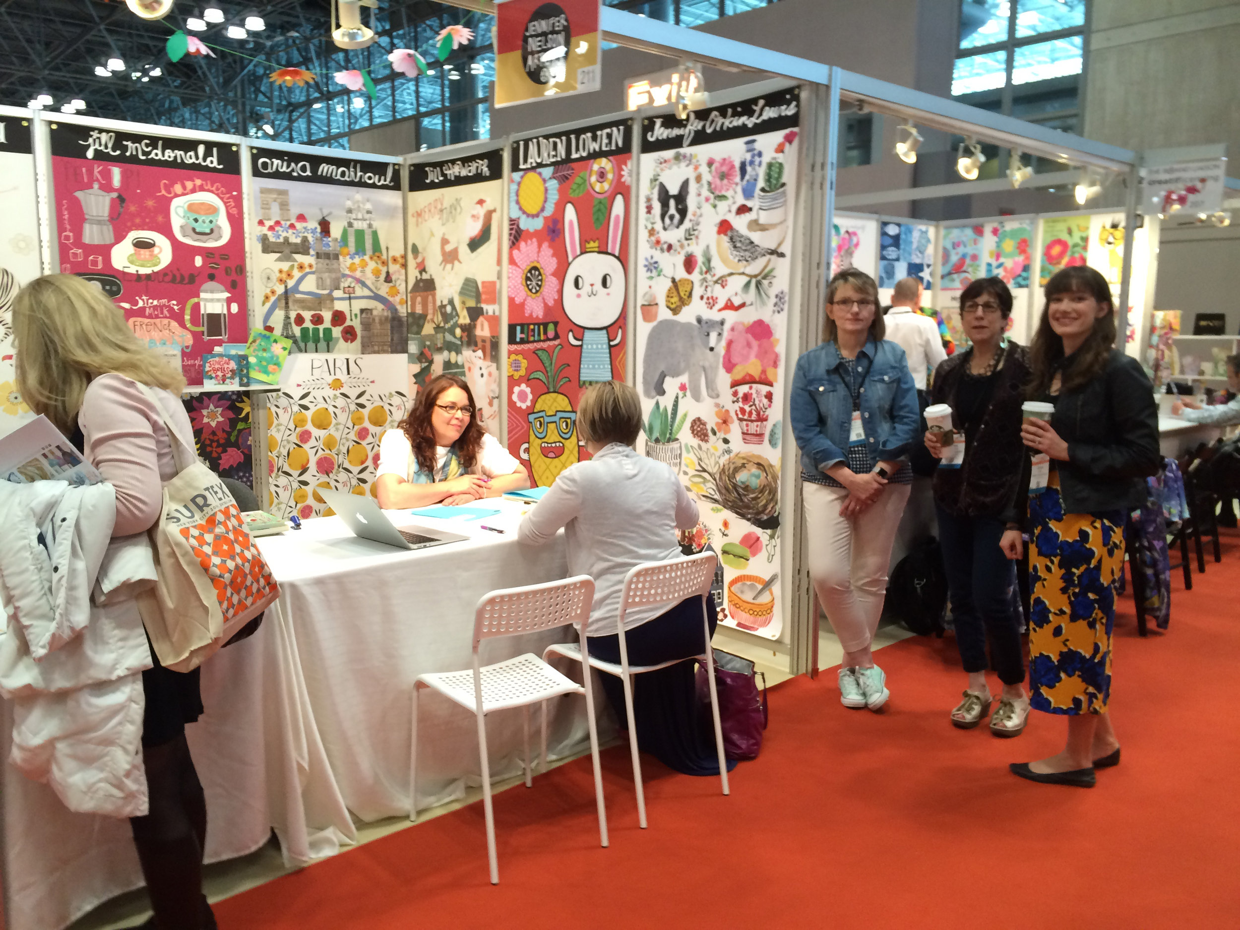 Jennifer Nelson Artists' booth stands out as a wonderful example of great booth design and representing great artists like Lauren Lowen, Jennifer Orkin Lewis (aka August Wren), Jill Howarth, Anisa Makhoul, Jill McDonald, Bee Brown, and Jessica Swift.