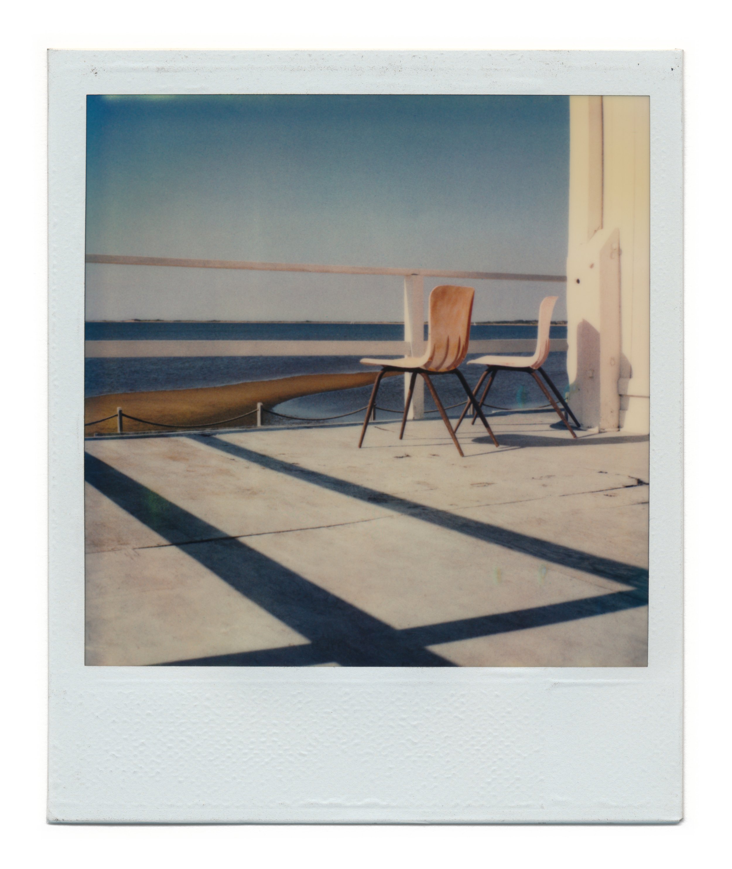 RF_Polaroid_081_ChairsByTheSea (1).jpg