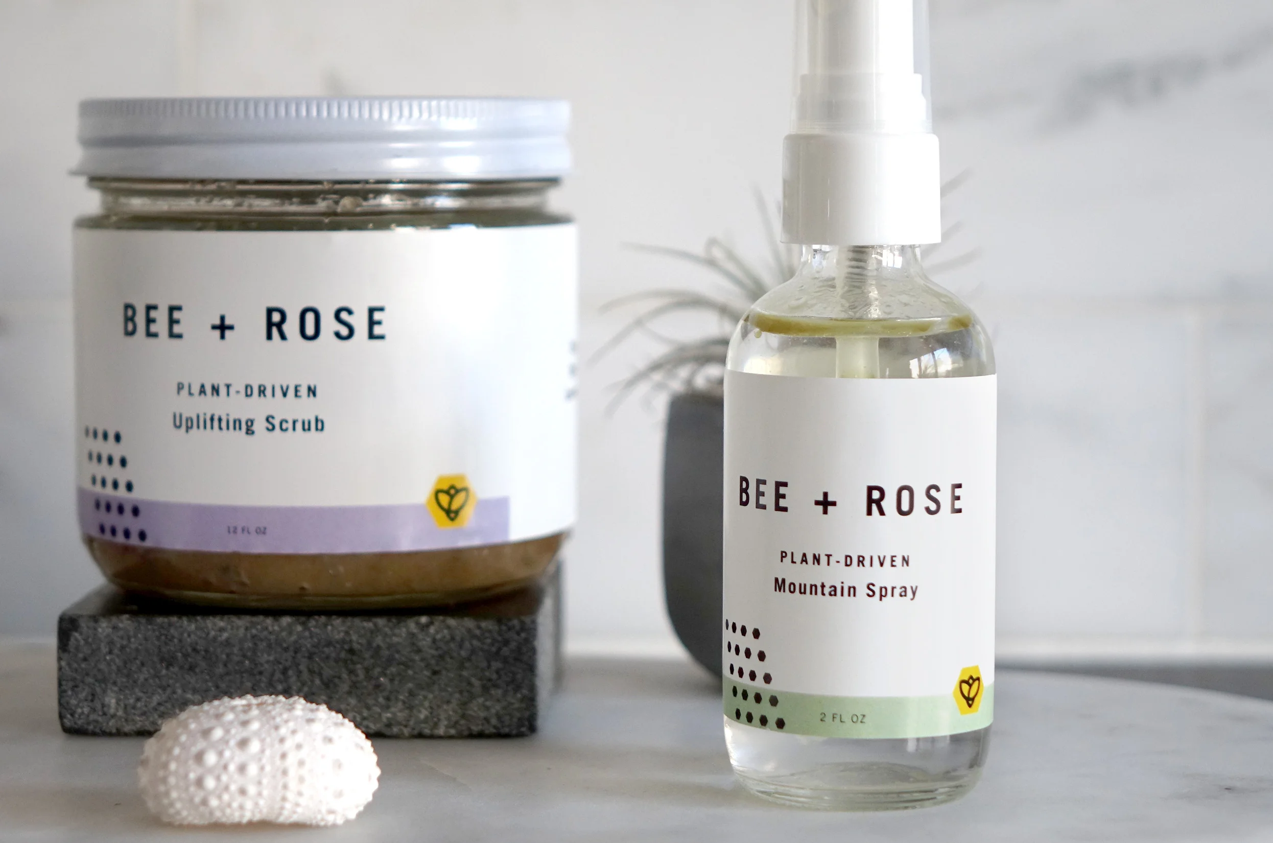 Using ingredients like wild-crafted essential oils and Colorado spring water, Bee + Rose makes plant-driven sprays and scrubs that help customers relax and rejuvenate. Together, we created simple, clean labels, utilizing a bee/rose mark and a beehive pattern.