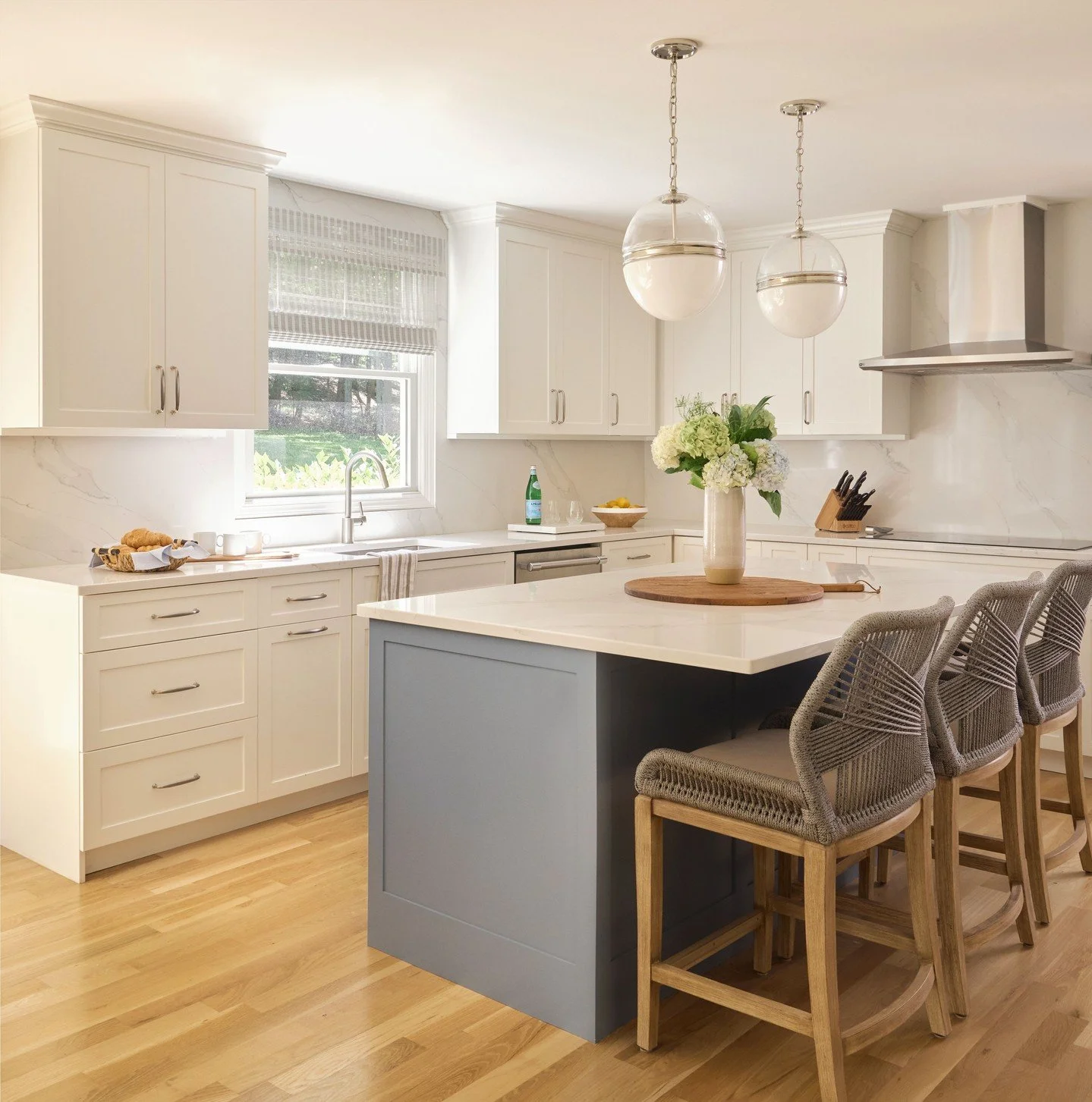 Morning light, fresh coffee, and a kitchen that feels like a breath of fresh air🍃The perfect blend of calm neutrals, soft blue, and woven texture🤍#JKCDesigns #KitchenDesign #NeutralPalette #NeutralInteriors #ClassicComfort#ModernTraditional #SoftTe