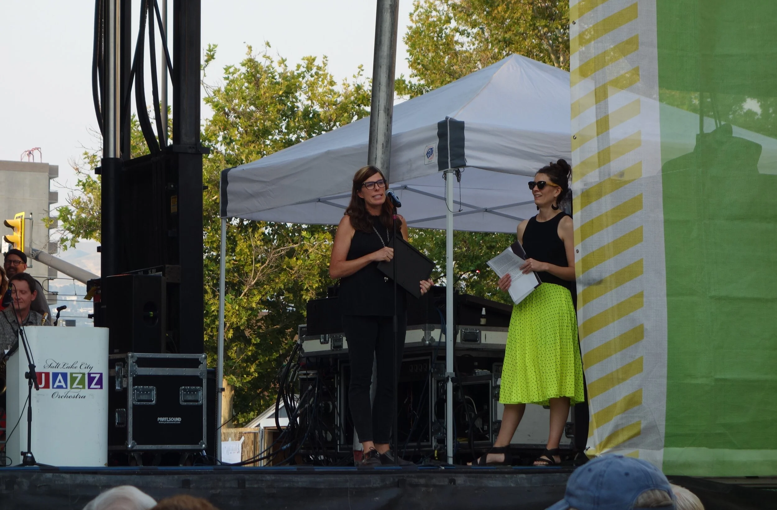 Megan Hallett receiving the Mayor’s Artist Award at the 2021 Utah Arts Festival.