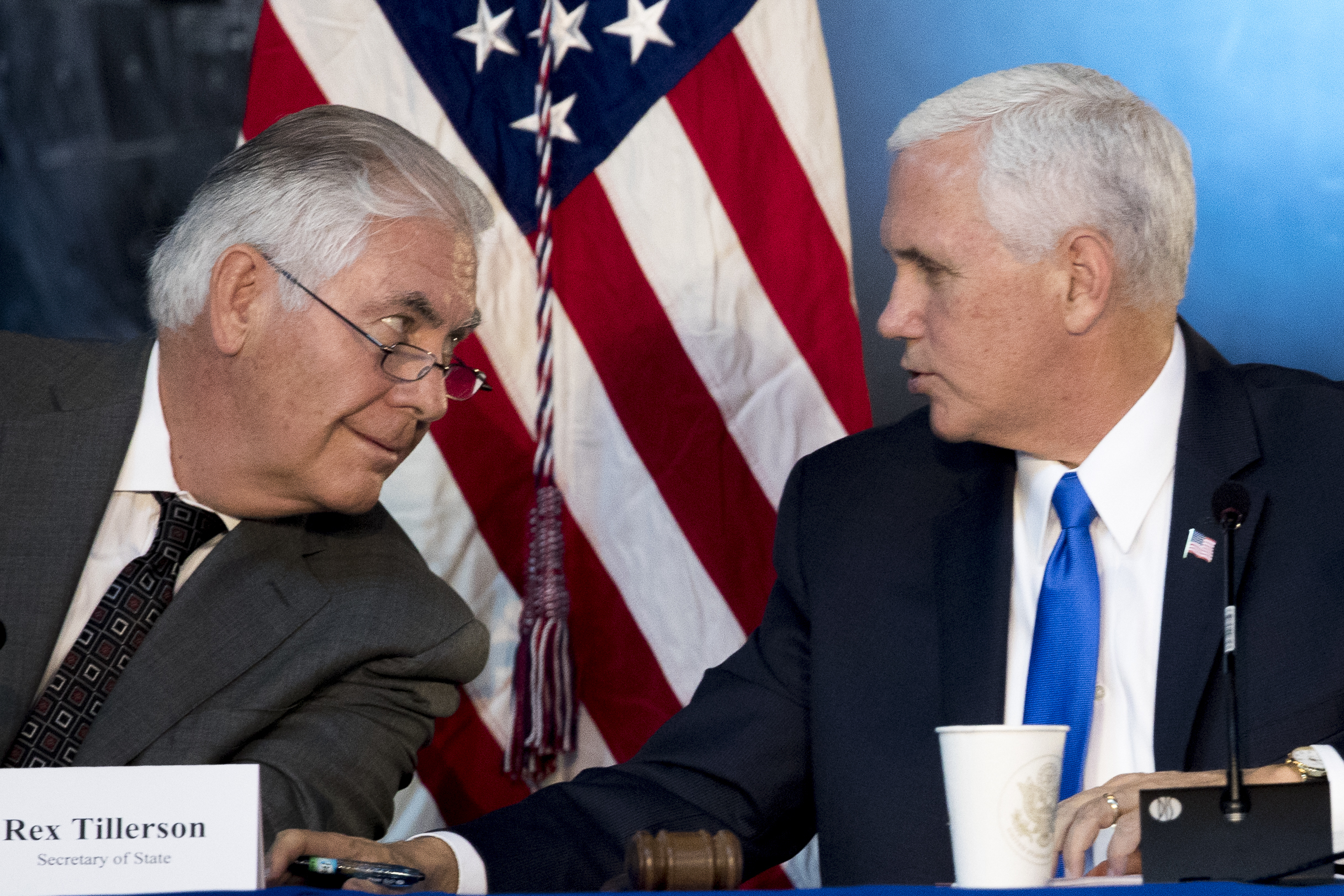  Secretary of State Rex Tillerson, left, speaks with Vice President Mike Pence, right, during the National Space Council's first meeting at the Steven F. Udvar-Hazy Center, Thursday, Oct. 5, 2017 in Chantilly, Va. (AP Photo/Andrew Harnik) 