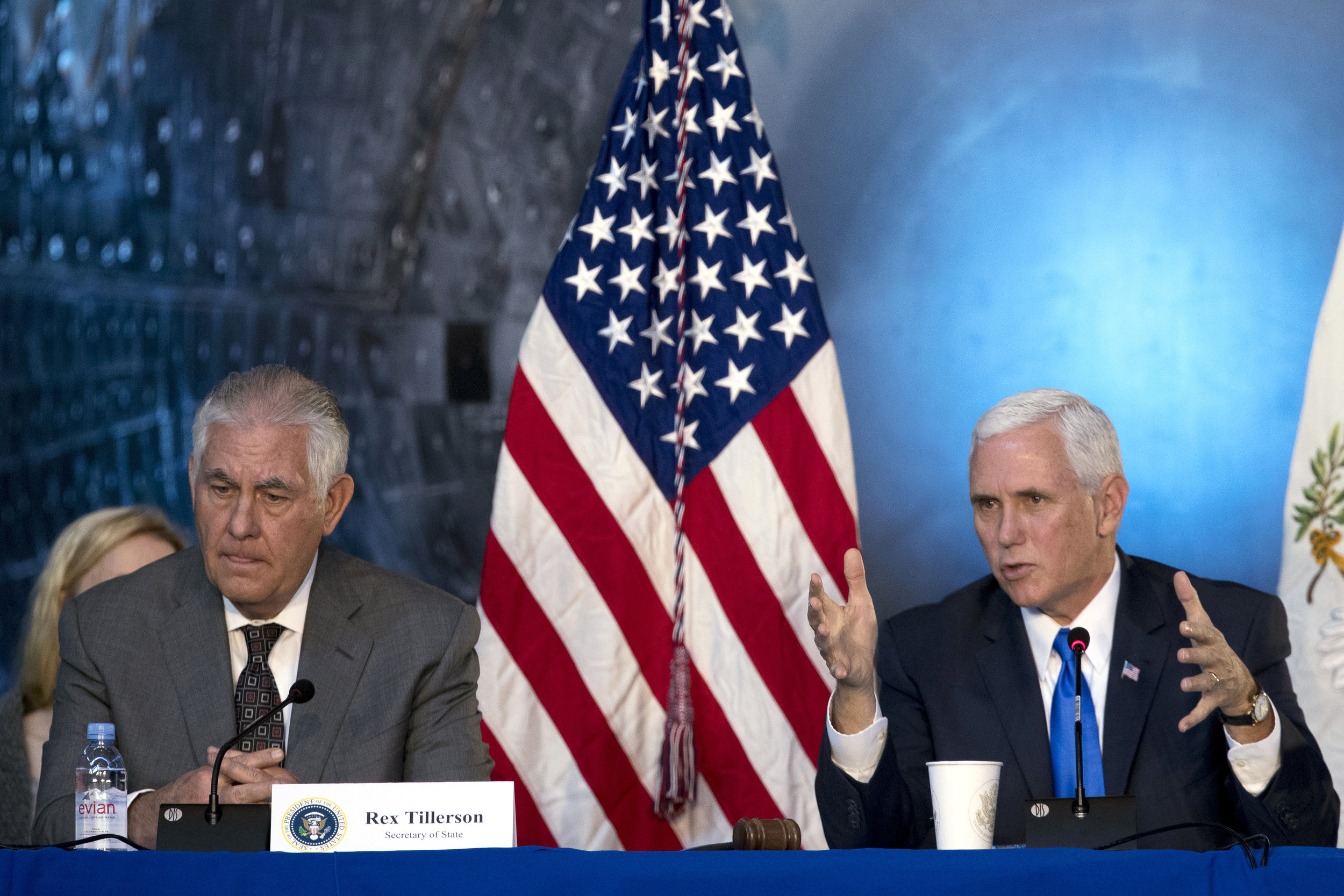  Vice President Mike Pence, right, accompanied by Secretary of State Rex Tillerson, left, speaks during the first meeting of the National Space Council at the Steven F. Udvar-Hazy Center, Thursday, Oct. 5, 2017, in Chantilly, Va. (AP Photo/Andrew Har