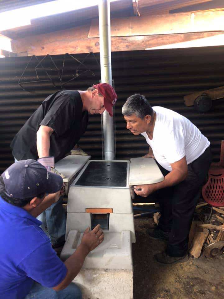 installing a wood burning stove.jpeg