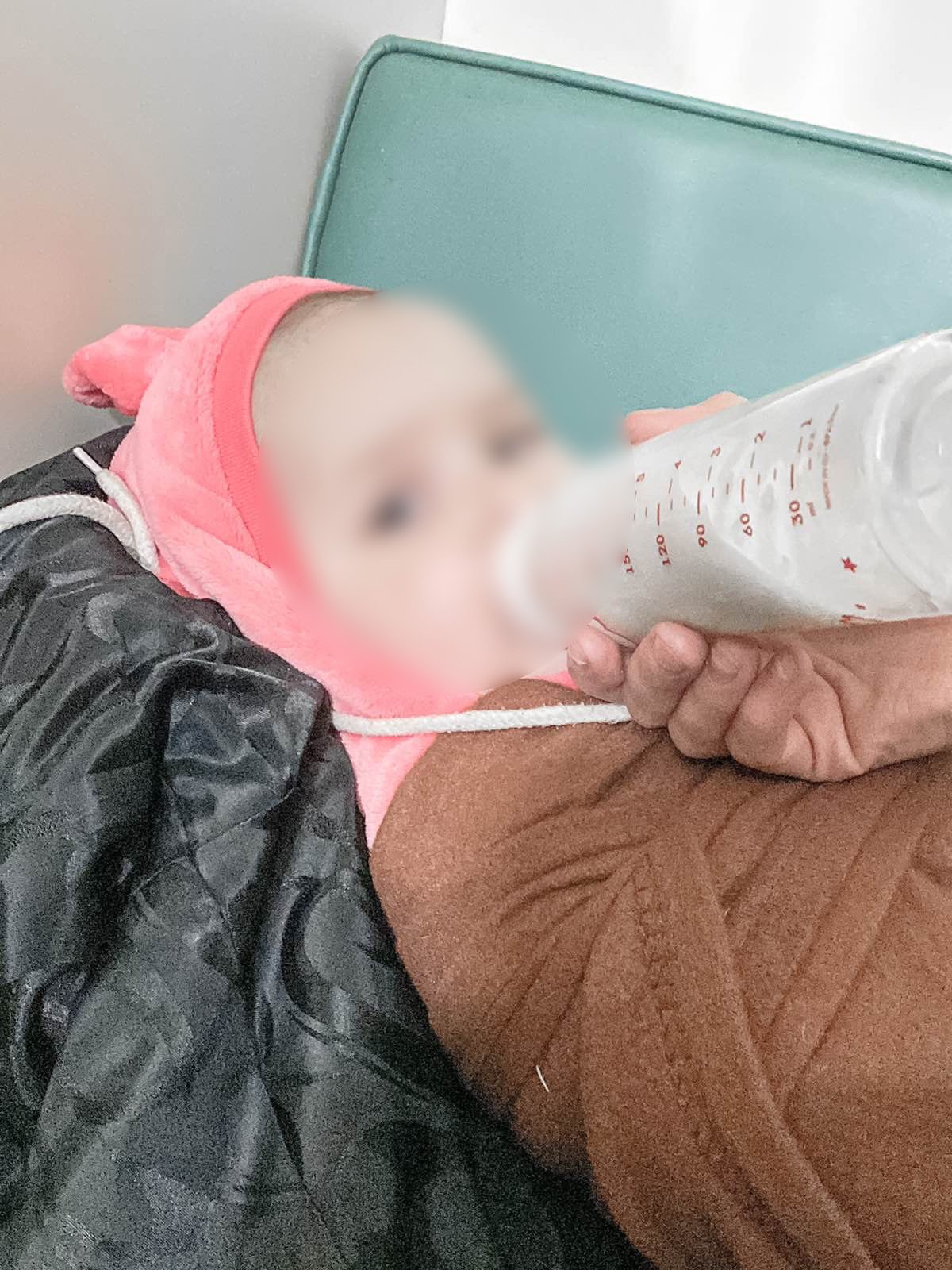 Ukrainian baby drinking bottle in Mobile medical van - C.jpeg