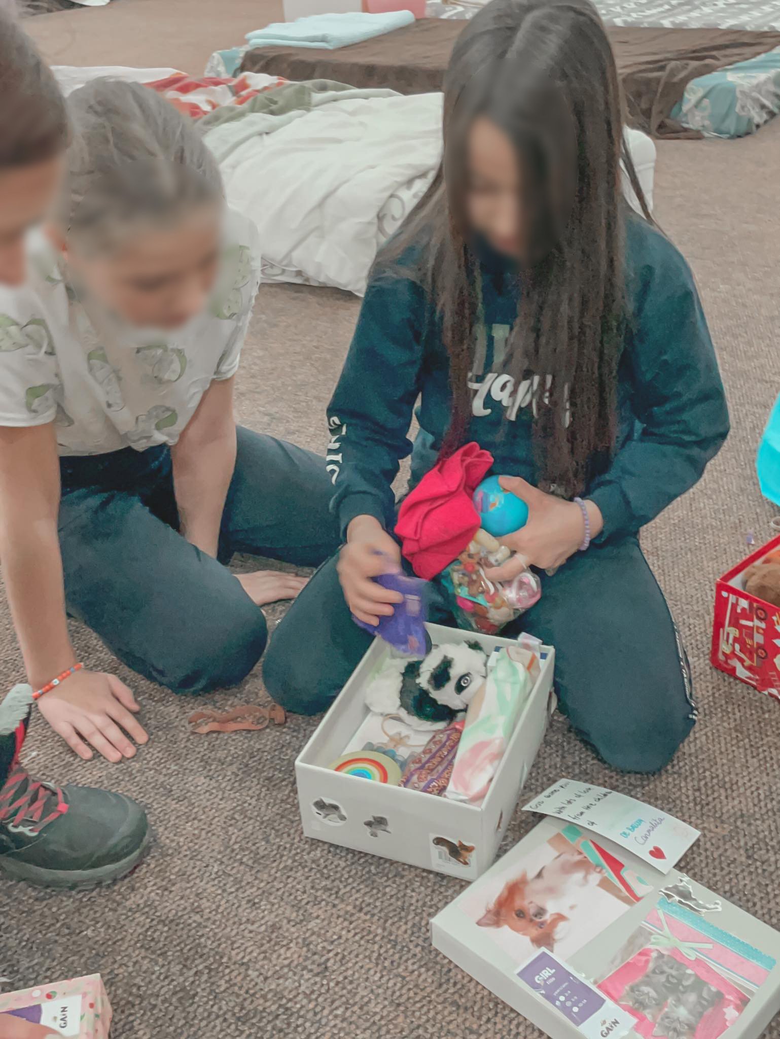 Ukrainian Refugee kids opening Operation Christmas Child boxes - 2.jpeg