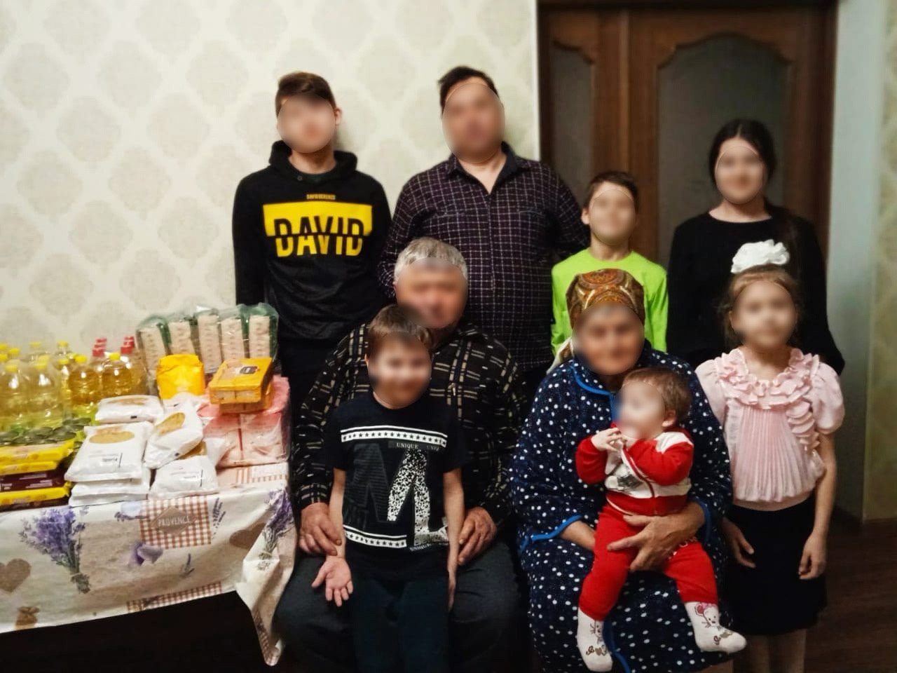 3rd Ukrainian family getting supplies.jpeg