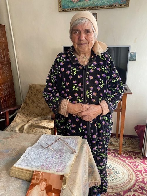 Romanian Woman with her Bible.JPG