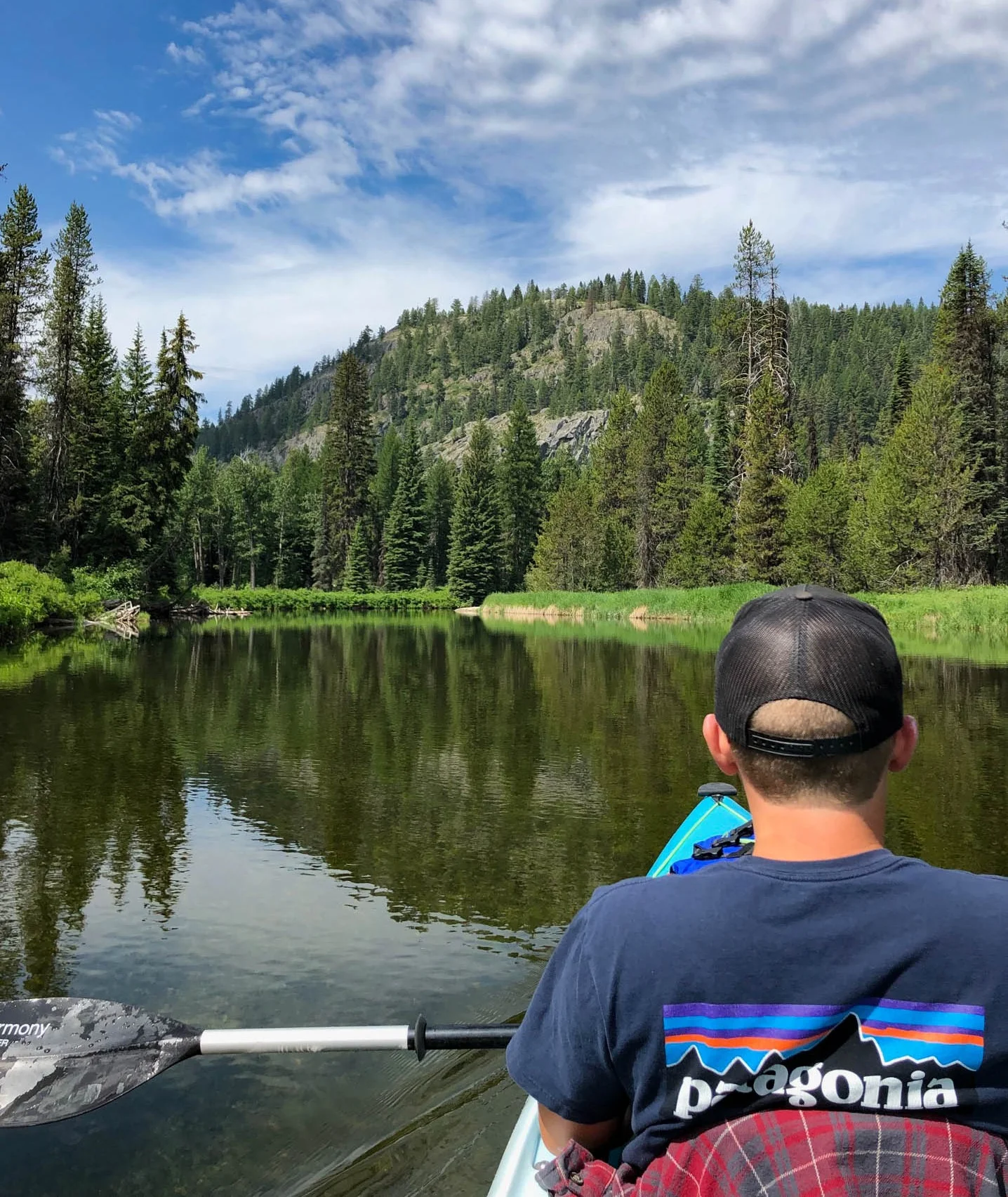 Justine and Brandon kayaking outside of McCall, ID