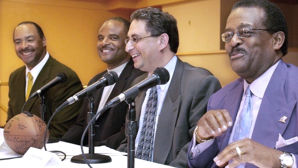 From left to right: Former NFL players Kellen Winslow Sr. and Warren Moon along with lawyers Cyrus Mehri and Johnnie L. Cochran Jr., who worked together to establish the NFL’s Rooney Rule. Los Angeles Sentinel