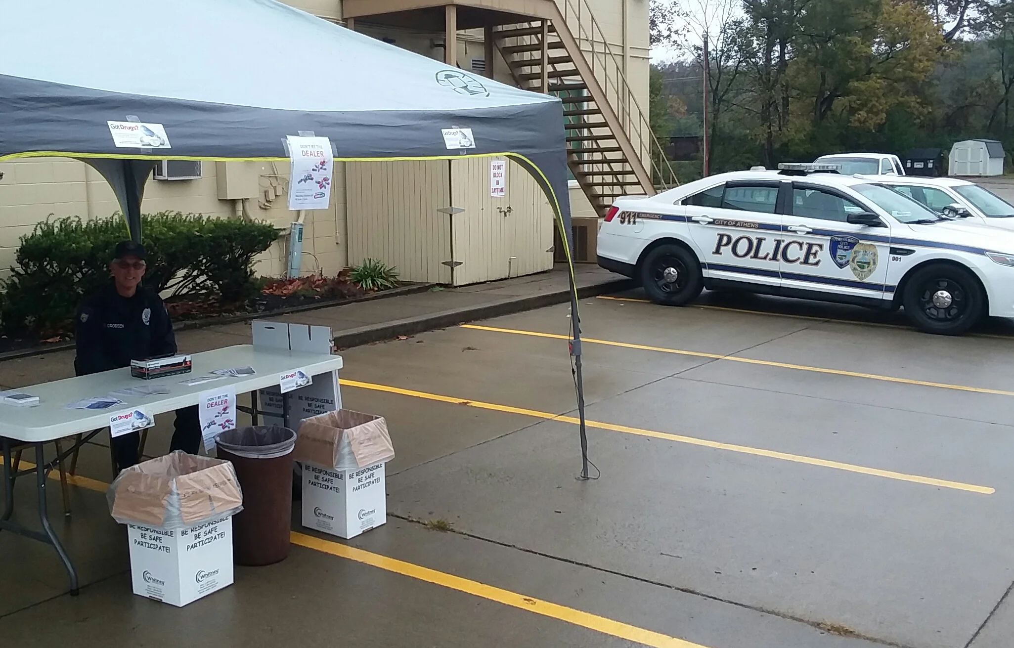 (Pictured is Officer Rick Crossen with the Athens Police Department during set up of the program in the Elks parking lot, prior to the event starting. )