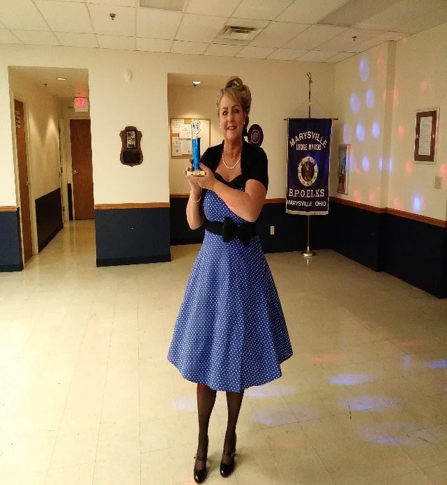 Winner of the best costume, Patrice West