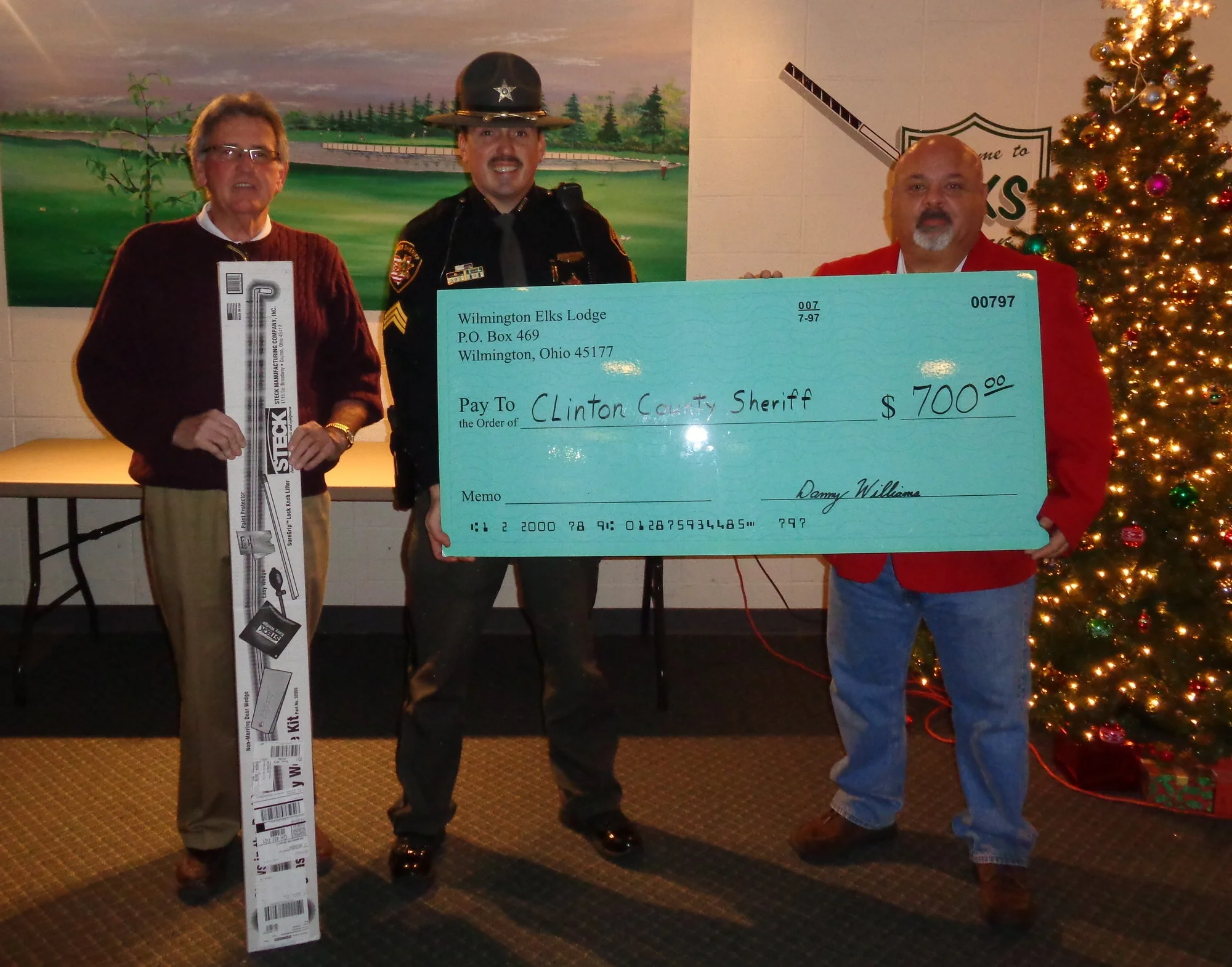 Pictured are Exalted Ruler, Dave Appleman, Sergeant Smith of the CCSO, and PER Bill Kassinos.
