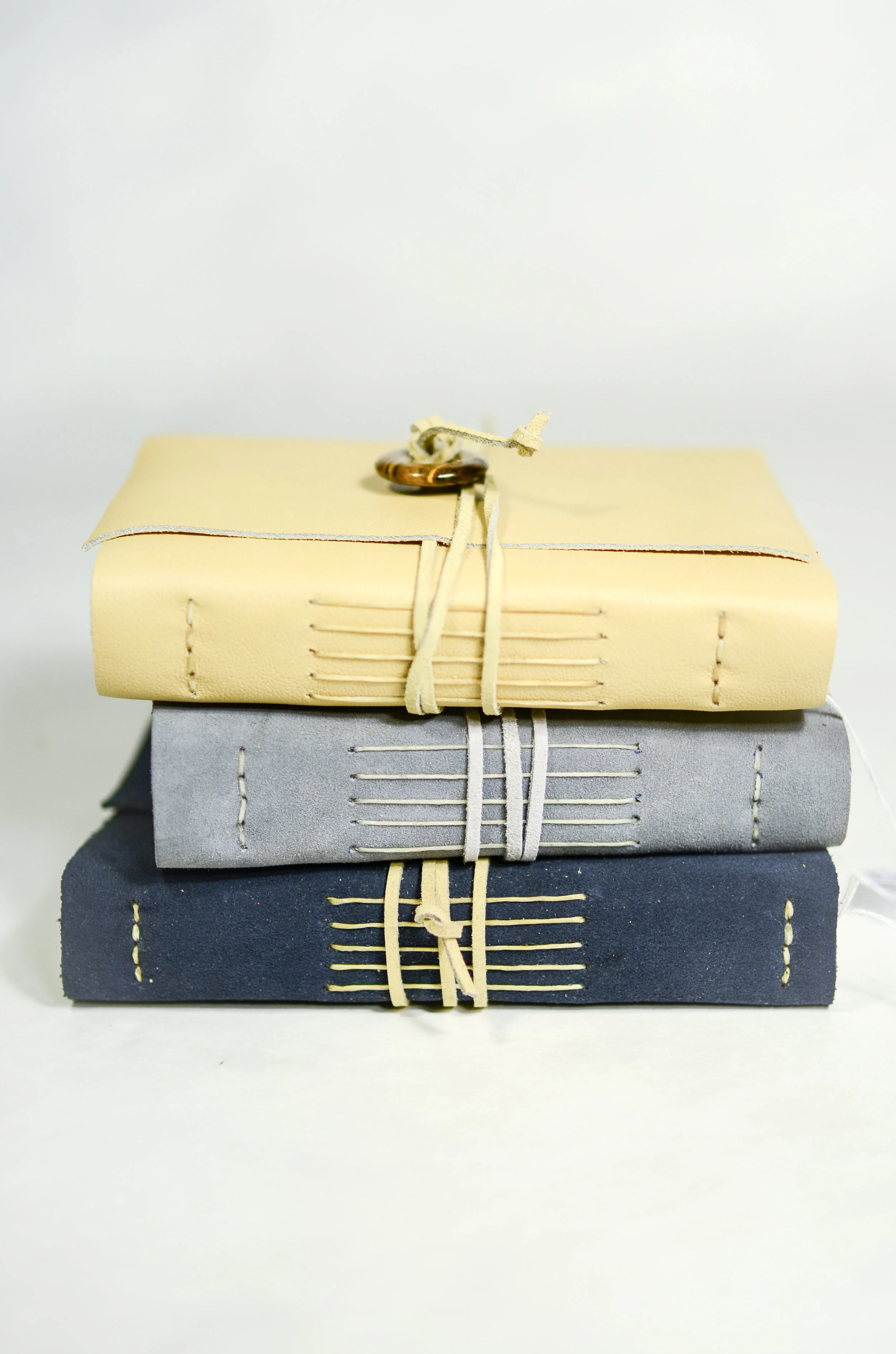 9. Michelle Metcalfe Hand-bound Leather Journals, $60.00 each