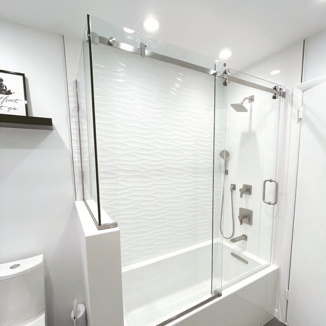 Make a statement with frameless shower doors #showerdoors