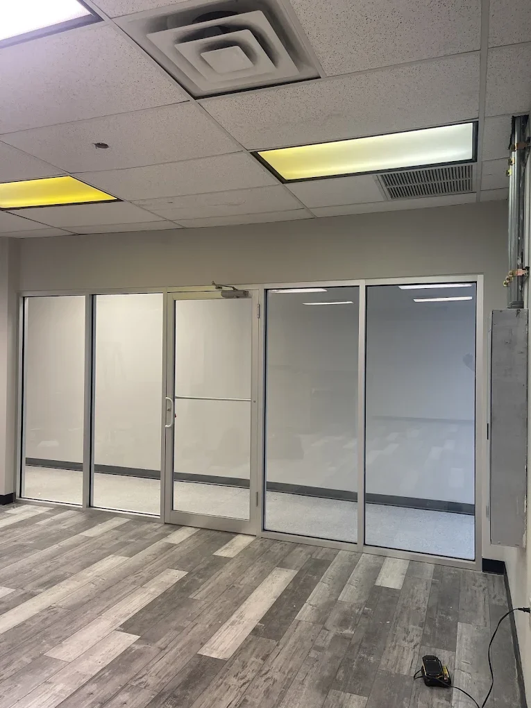framed glass alum wall.webp
