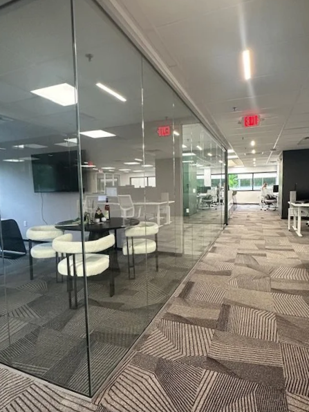 frameless Glass Partiiton wall installed with minimum hardare