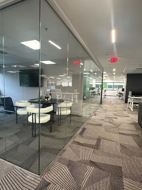 seamless glass office walls . patch fitting hardware for minimal obtruction 