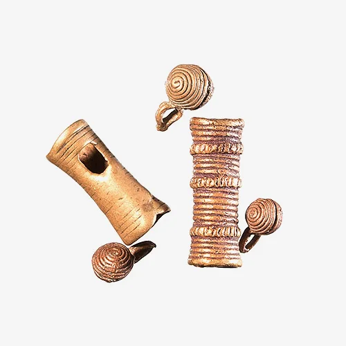 Antique Yoruba Brass Bells Material: Brass These antique brass (or copper alloy) bells were worn as hair ornaments or jewelry by the Yoruba people of West Africa. The antique bells show surface wear, holes and casting imperfections from extensive use. 