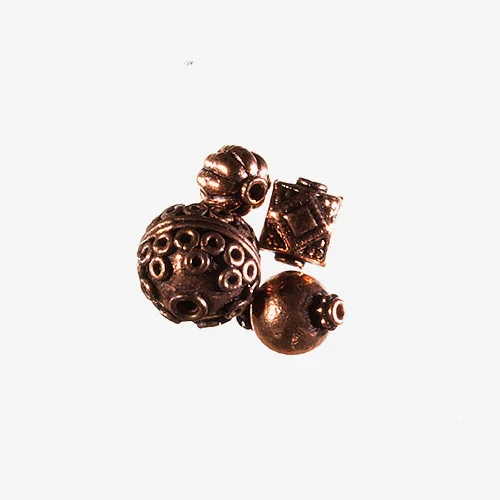 Copper Beads Material: Metal Copper is a metal that ranges in color from reddish brown to dark brown. Copper beads can be made from solid copper or a copper alloy. They are often made in bright highly polished copper, which can be treated with a thin coating to preserve its high luster. If not highly polished, copper beads can be coated with an antique finish to make them look oxidized and darker than highly polished copper. Copper can also have a blue green patina when it oxidizes. 