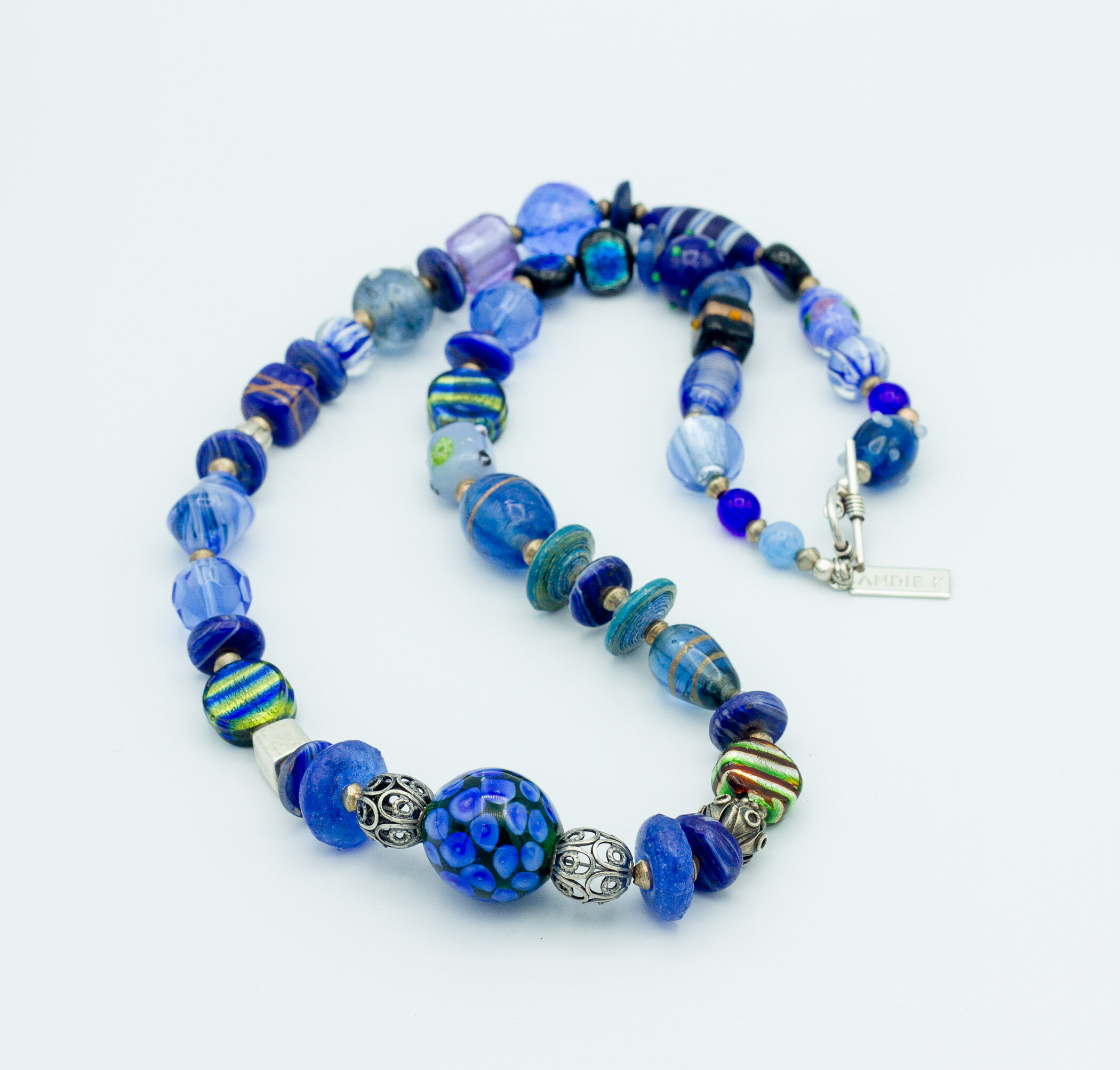 Lampwork glass, Uganda paper beads and Sterling Silver 