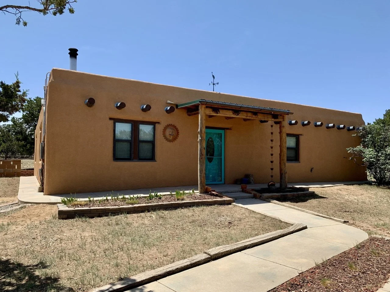 An Adobe on Over 2 Acres in Sandia Park, NM - $384,000