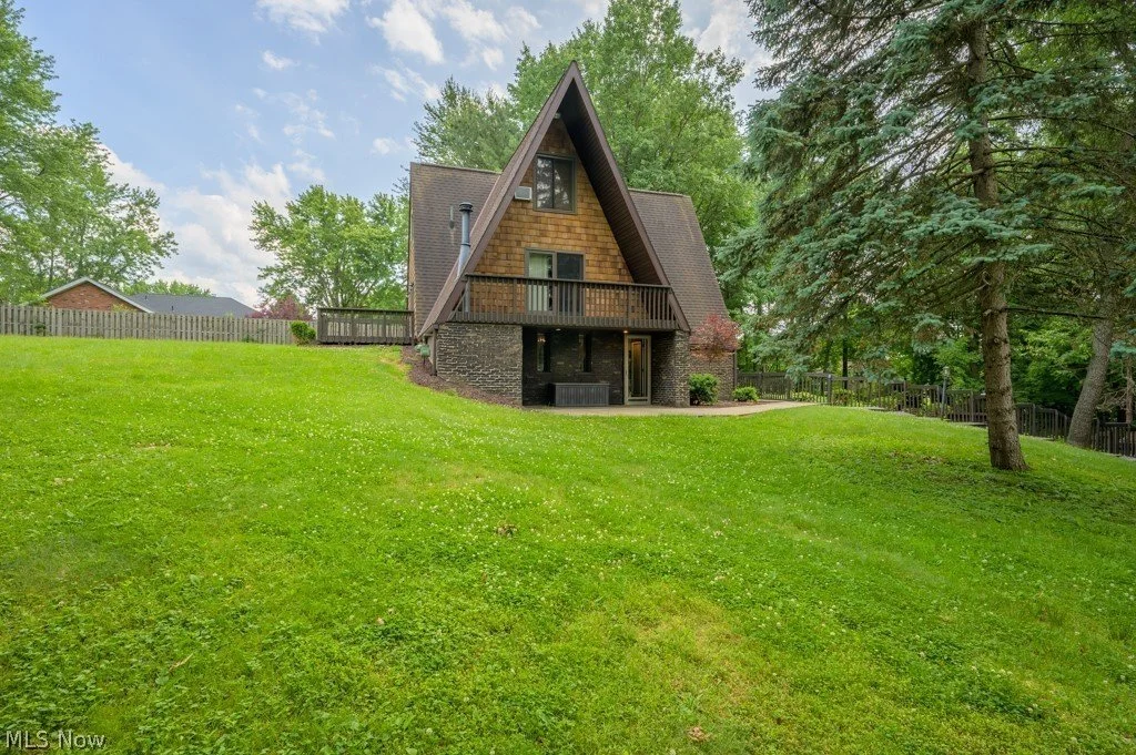 An A-Frame With a Stone Pool - $248,800