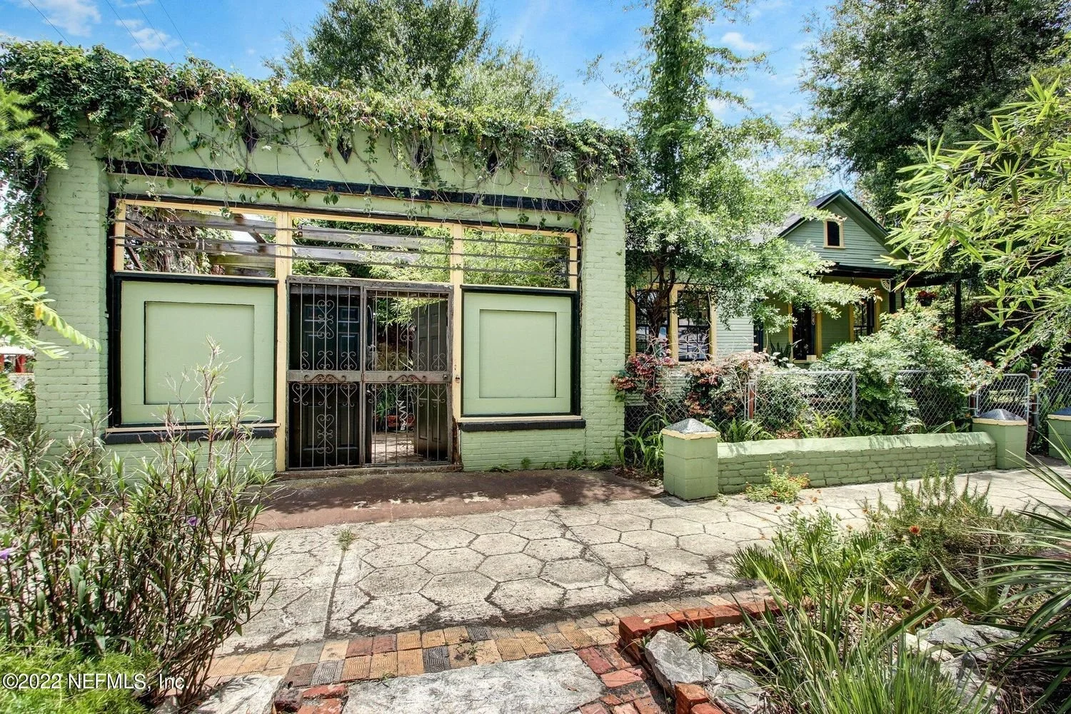 A Historic Storefront Converted to a Courtyard Garden - $299,900